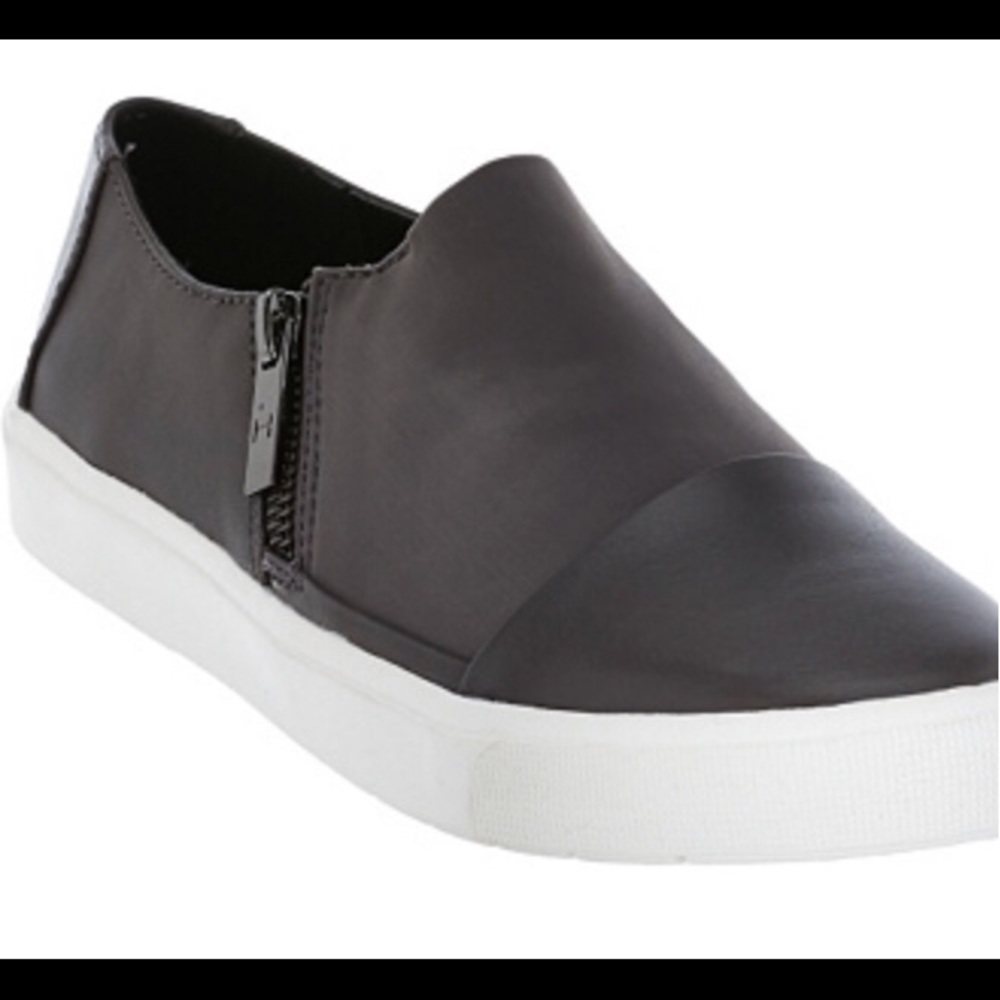 Black slip on sneakers with zipper detail